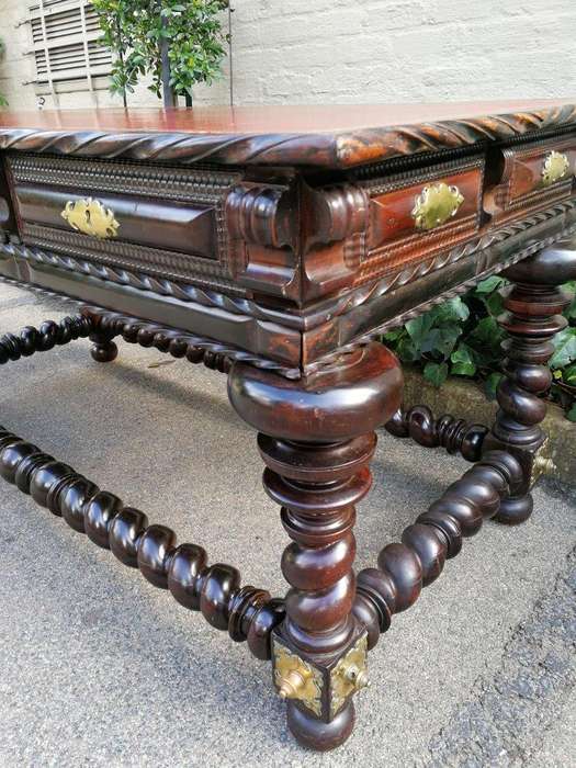 A 19th Century Portuguese Rosewood and Brass-mounted Writing Table With a Gilt-tooled Leather Wri...