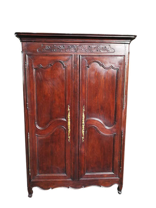 A Late 18th/early 19th century French Louis XV Oak Provincial Armoire, circa 1800, with original ...