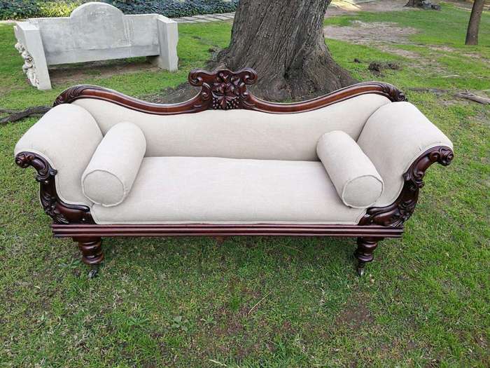 A Victorian Mahogany Settee In A Contemporary Wood Finish With Castors