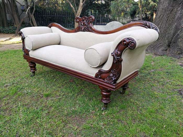 A Victorian Mahogany Settee In A Contemporary Wood Finish With Castors