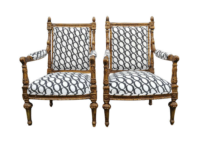 A Pair of French Style Ornately Carved and Gilded Armchairs ND