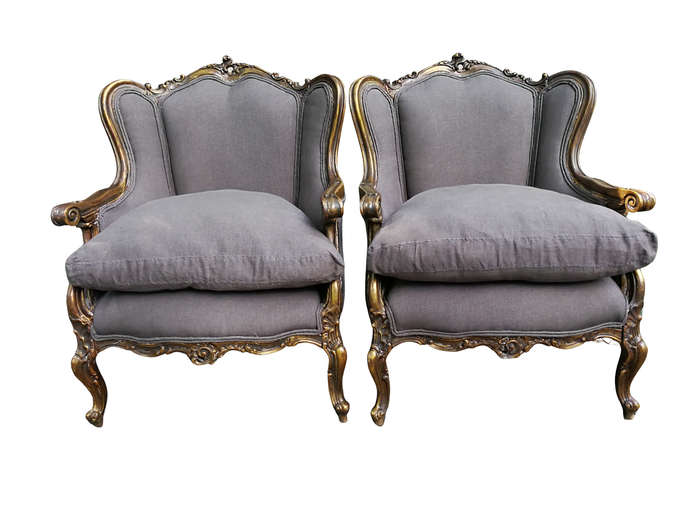 A 20th Century Pair Of French Style Hand Gilded Bergere/Wing-Back Armchairs Upholstered In An Imp...