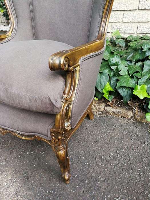 A 20th Century Pair Of French Style Hand Gilded Bergere/Wing-Back Armchairs Upholstered In An Imp...