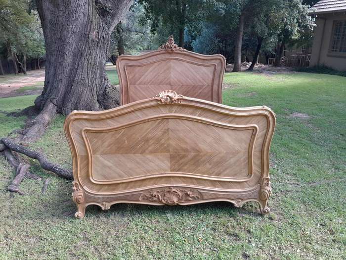 A 19th Century Circa 1880 Ornately Carved and Inlaid Marquetry Bed in a Contemporary Bleached Finish