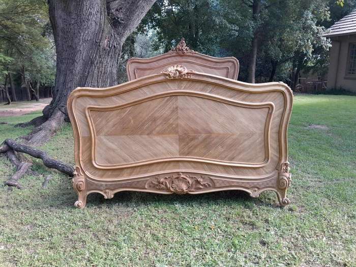 A 19th Century Circa 1880 Ornately Carved and Inlaid Marquetry Bed in a Contemporary Bleached Finish
