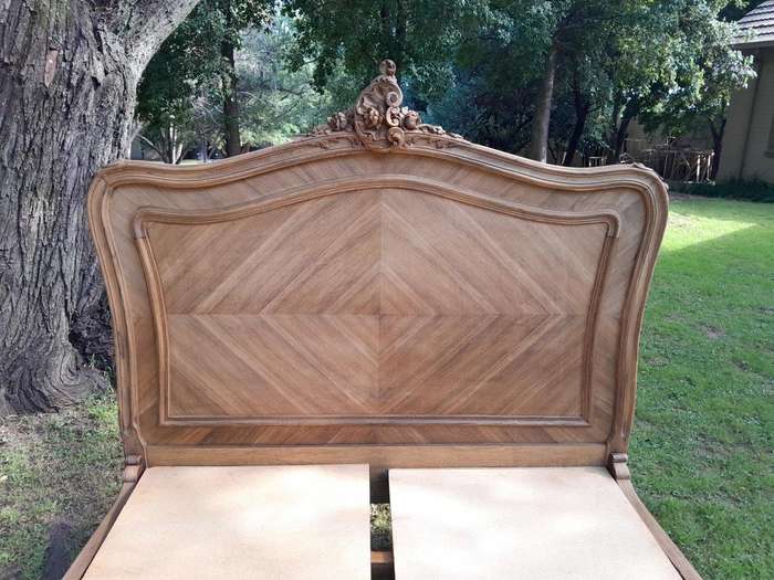 A 19th Century Circa 1880 Ornately Carved and Inlaid Marquetry Bed in a Contemporary Bleached Finish