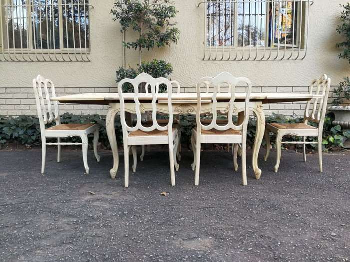 A 20TH Century French Set of Six Carved Dining Chairs with Rush Seats in a Contemporary Bleached ...