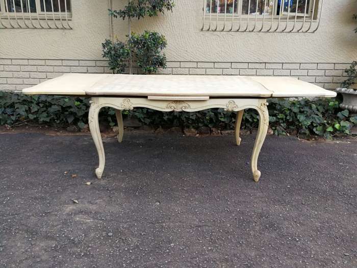 A 20TH Century French Set of Six Carved Dining Chairs with Rush Seats in a Contemporary Bleached ...