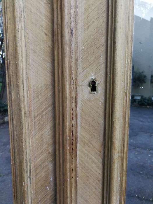 A 19th Century French Rococo Armoire In A Bleached Contemporary Finish With Bevelled Mirrors