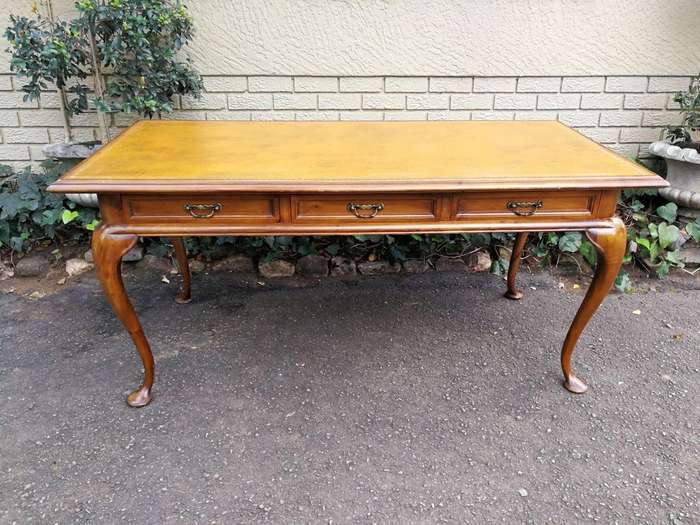 A 20th Century Victorian-Style Blonde Mahogany Desk With Leather And Gilt Tooling And Three Drawe...