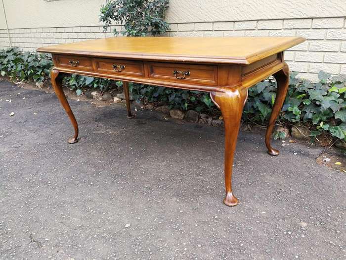A 20th Century Victorian-Style Blonde Mahogany Desk With Leather And Gilt Tooling And Three Drawe...