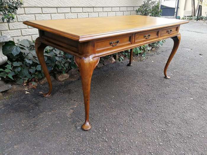 A 20th Century Victorian-Style Blonde Mahogany Desk With Leather And Gilt Tooling And Three Drawe...