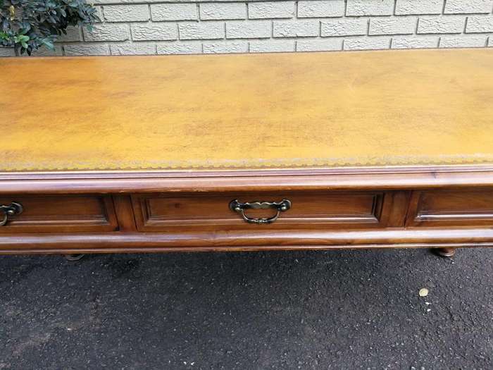 A 20th Century Victorian-Style Blonde Mahogany Desk With Leather And Gilt Tooling And Three Drawe...