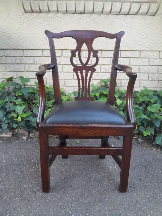 A 19th Century / Circa 1810 Victorian Pair of Carved Oak Armchairs Upholstered in Leather
