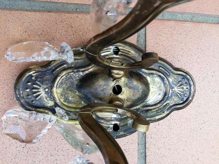 A 20th Century French Pair Of Brass And Crystal Wall Lights