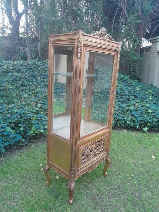 A French Louis XVI Showcase From The 1800s Gilded With Gold Leaf