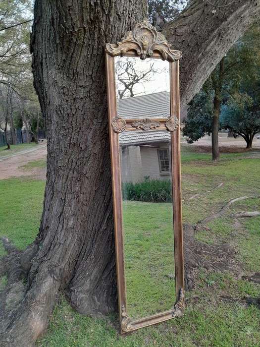 An Ornate Carved Rococo French Style Bevelled Mirror