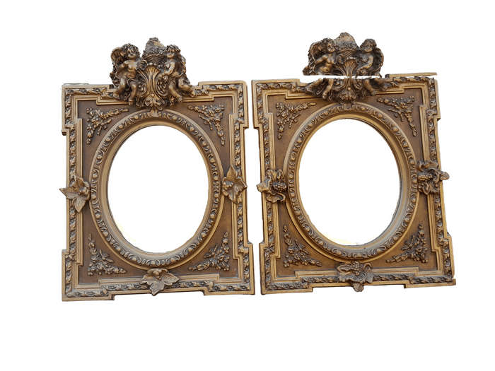 An Exceptional Pair of 20th Century French Style Ornately Carved and Gilded Bevelled Mirrors with...
