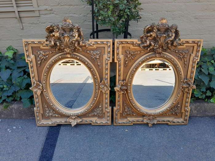 An Exceptional Pair of 20th Century French Style Ornately Carved and Gilded Bevelled Mirrors with...