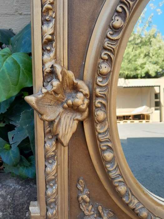 An Exceptional Pair of 20th Century French Style Ornately Carved and Gilded Bevelled Mirrors with...