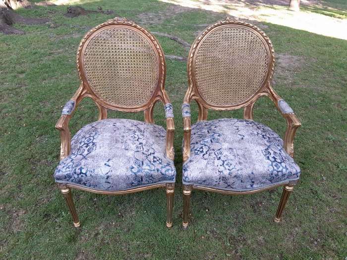 A Pair of 20th Century French Style Rattan-Back Gilded Arm Chairs