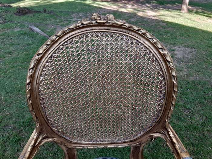A Pair of 20th Century French Style Rattan-Back Gilded Arm Chairs