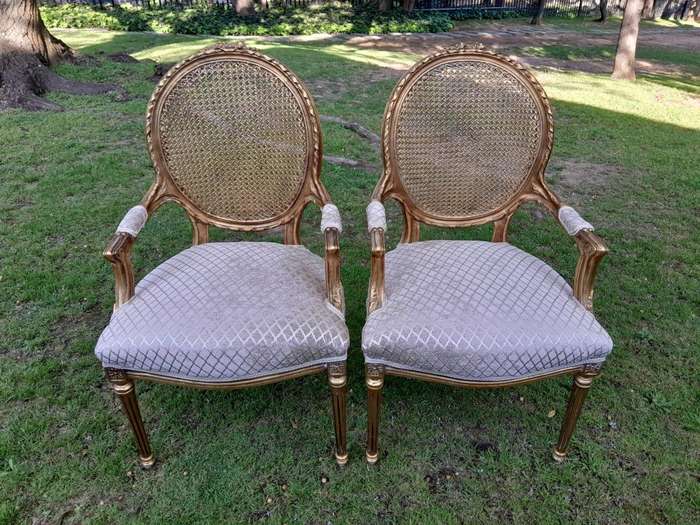 A Pair of 20th Century French Style Rattan-Back Gilded Arm Chairs