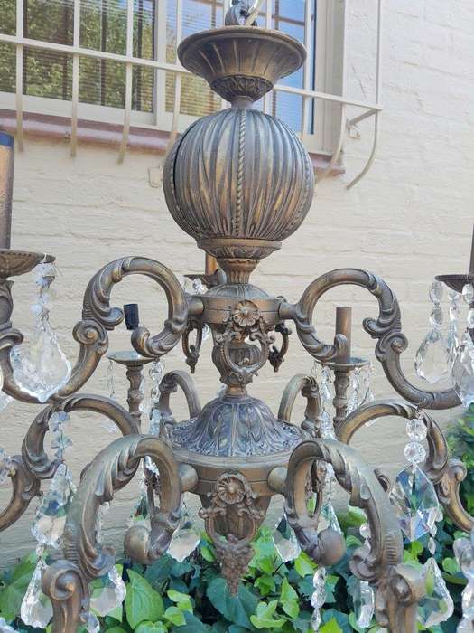 A 20th Century French Style Brass and Crystal Chandelier