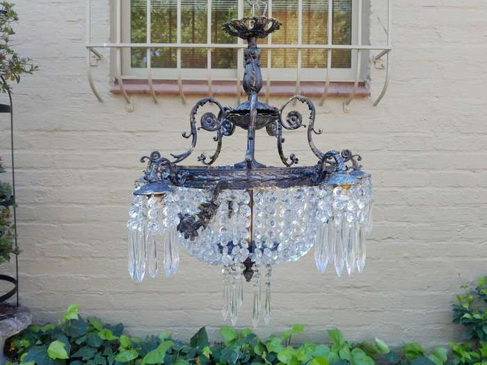 A 20th Century French Style Brass and Crystal Chandelier