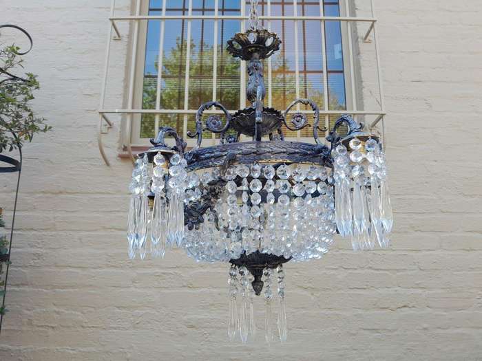 A 20th Century French Style Brass and Crystal Chandelier