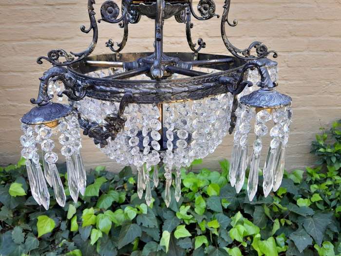 A 20th Century French Style Brass and Crystal Chandelier