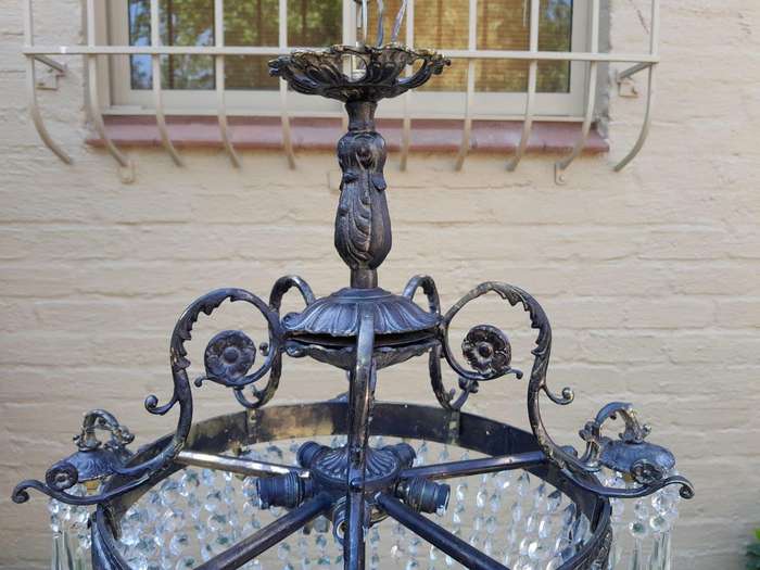 A 20th Century French Style Brass and Crystal Chandelier