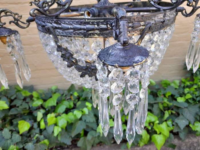 A 20th Century French Style Brass and Crystal Chandelier
