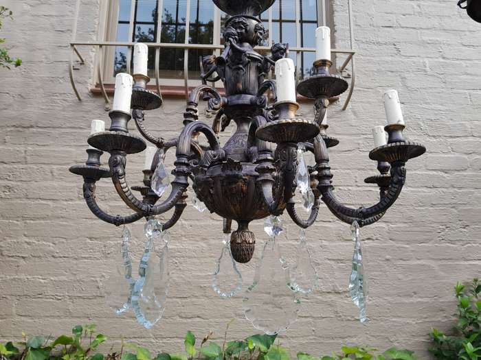 A 20th Century French Style Brass and Crystal Chandelier with Brass and Crystals