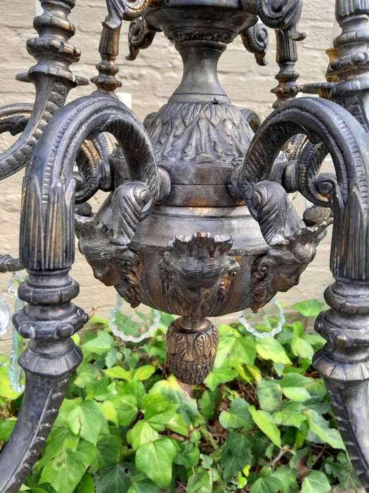 A 20th Century French Style Brass and Crystal Chandelier with Brass and Crystals