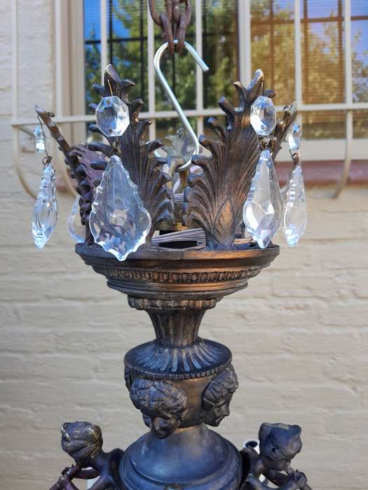 A 20th Century French Style Brass and Crystal Chandelier with Brass and Crystals