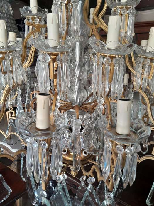 A 20th Century Large French Style Brass And Crystal Chandelier
