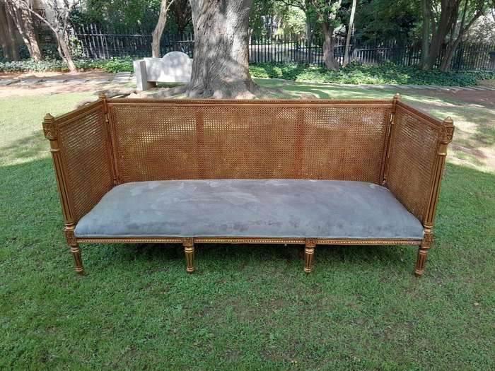 A 20th Century French Style Carved And Hand Gilded Rattan Day Bed / Settee