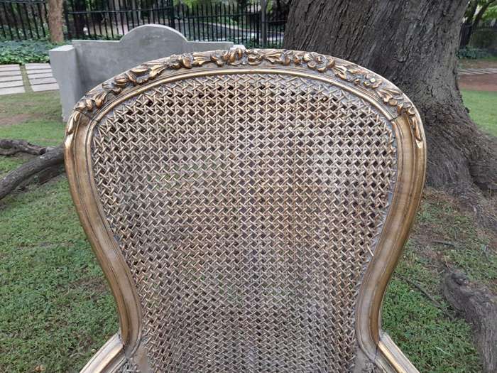A 20th Century Pair Of French Style Rattan High Back Armchairs Hand Gilded