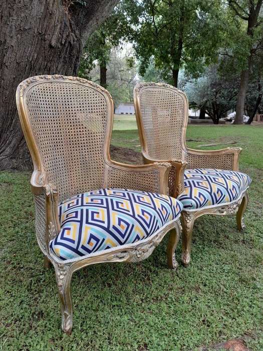 A 20th Century Pair Of French Style Rattan High Back Armchairs Hand Gilded