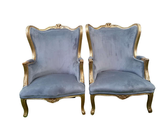 A Pair Of French Style Carved Wooden Wingback Armchairs
