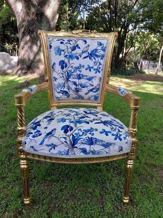 A Pair Of French Style Ornately Carved Wooden Armchairs