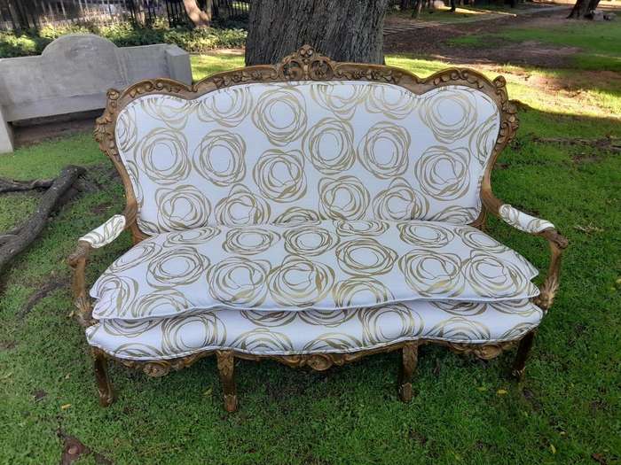 A 20TH Century French Hand Carved and Hand Gilded Settee