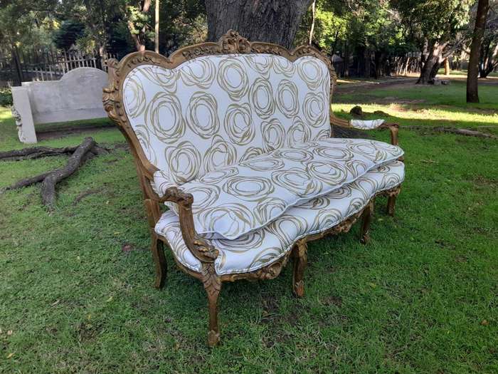 A 20TH Century French Hand Carved and Hand Gilded Settee