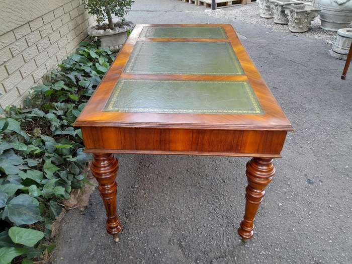 A 20th Century Kingswood Writing Table / Desk With Gilt Tooled Leather With Three Drawers On Bras...