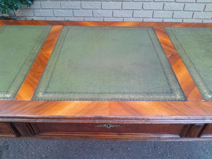 A 20th Century Kingswood Writing Table / Desk With Gilt Tooled Leather With Three Drawers On Bras...