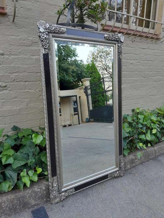 A French Baroque Style Large Bevelled Plate Black And Silver Leaf Mirror