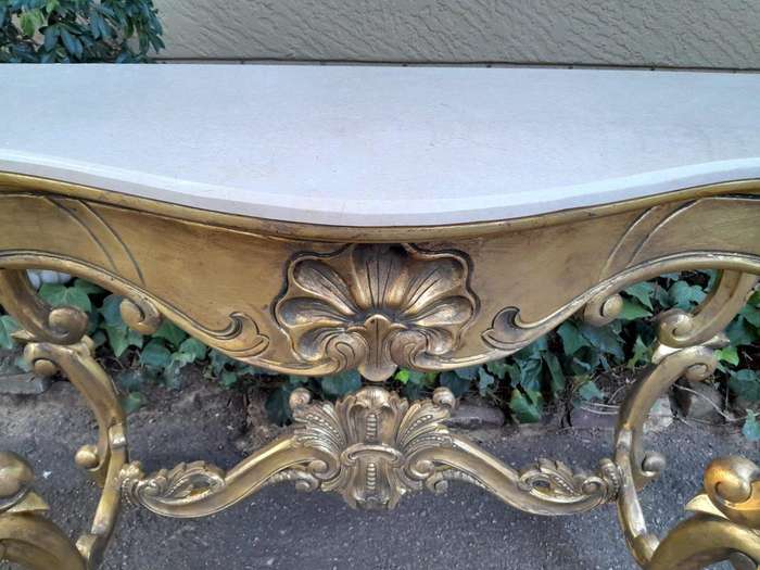 A Gilded Console Table with Marble Top