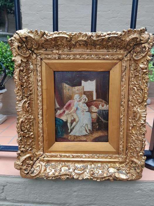 A 20th Century Pair Of Two Couples Oil Painting In Ornately Carved And Gilded Frames