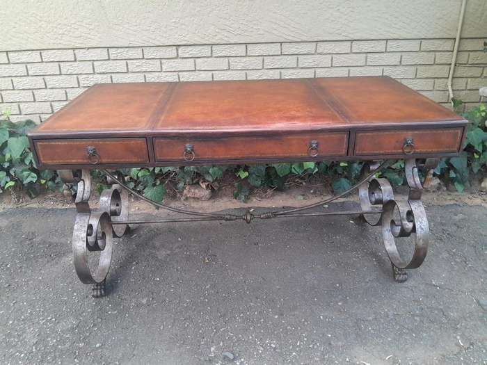 A 20TH Century American Maitland-Smith Victorian Style Leather Clad Wooden Table Desk On A Metal ...